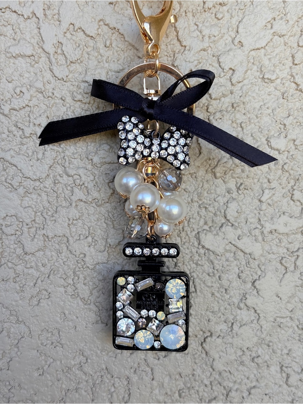 Luxe Crystal Bow & Pearl Perfume Bottle Keychain